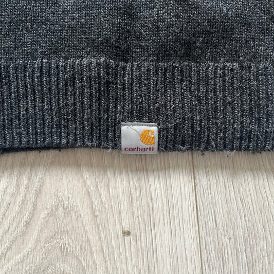  The Carhartt WIP Allen Sweater blends function and refinement in a dark gray wool–nylon knit. Midweight with ribbed details at the neck, cuffs, and hem, it ensures warmth and flexibility. A classic, durable knit that captures the minimal craftsmanship of Carhartt WIP.