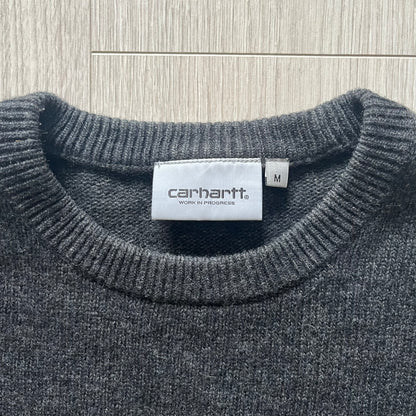  The Carhartt WIP Allen Sweater blends function and refinement in a dark gray wool–nylon knit. Midweight with ribbed details at the neck, cuffs, and hem, it ensures warmth and flexibility. A classic, durable knit that captures the minimal craftsmanship of Carhartt WIP.