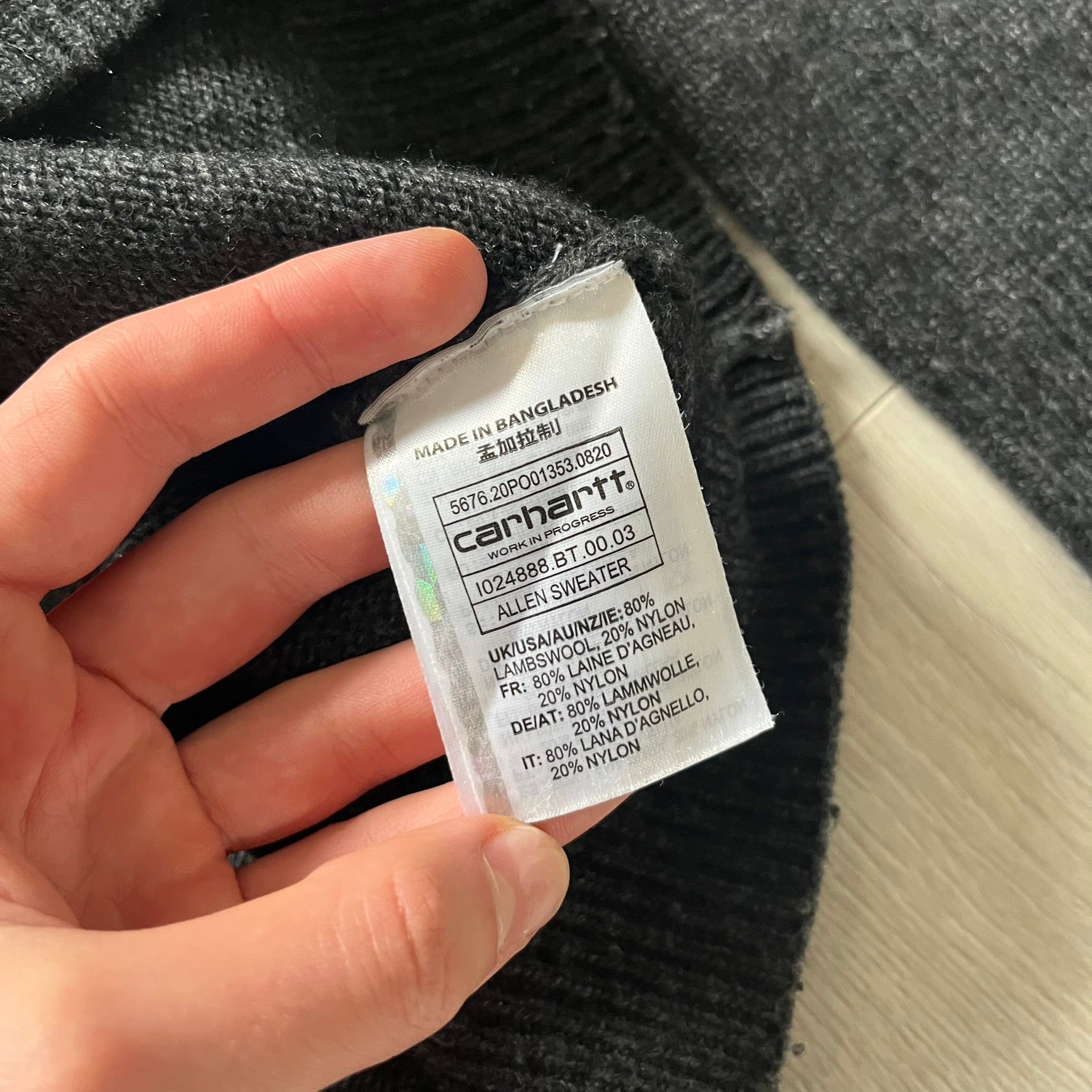  The Carhartt WIP Allen Sweater blends function and refinement in a dark gray wool–nylon knit. Midweight with ribbed details at the neck, cuffs, and hem, it ensures warmth and flexibility. A classic, durable knit that captures the minimal craftsmanship of Carhartt WIP.