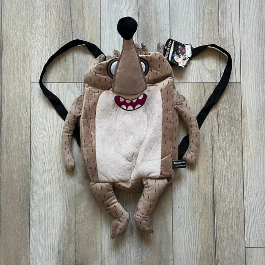 Cartoon Network Regular Show Rigby 2016 Backpack is a character-shaped backpack designed as Rigby from the animated series Regular Show. The bag features a full plush body construction with movable arms, legs, and mouth, while the eyes and mouth are finished with embroidered detailing. Adjustable straps are attached from the top to the lower back of the character, allowing it to be worn as a standard backpack. The design follows Rigby’s appearance with brown fur tones, dark raccoon-style eye mask markings, 