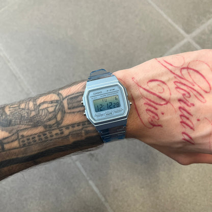 Custom Casio F-91W Blue digital watch featuring a Gradient blue filter screen. Slim 8.5 mm profile, lightweight 21 g build and flexible bio-based resin band ensure lasting comfort. Includes alarm, stopwatch, and microlight function for everyday functionality.