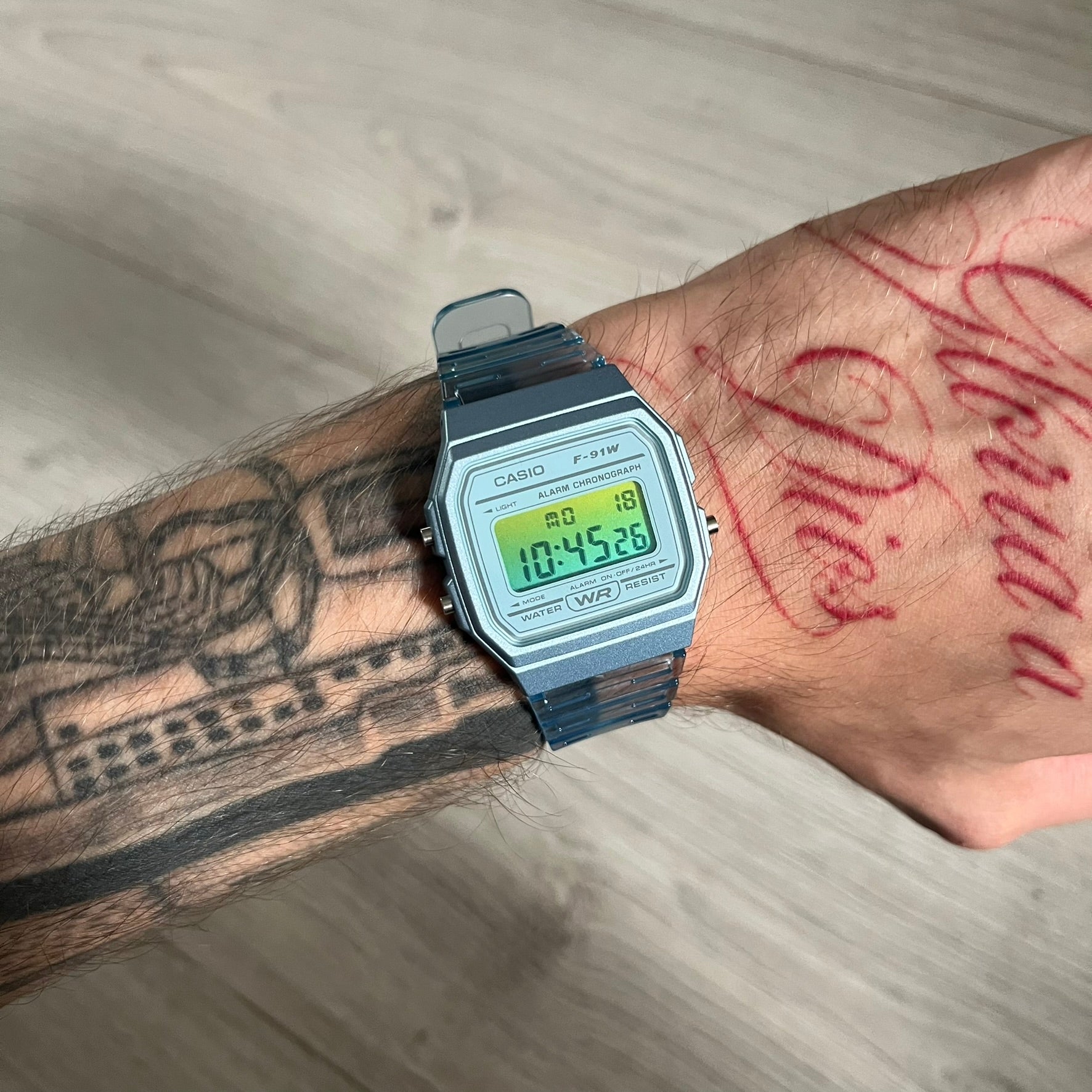 Custom Casio F-91W Blue digital watch featuring a Gradient Blue and green filter screen. Slim 8.5 mm profile, lightweight 21 g build and flexible bio-based resin band ensure lasting comfort. Includes alarm, stopwatch, and microlight function for everyday functionality.