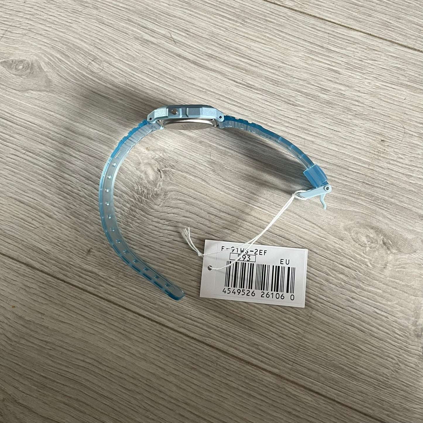 Custom Casio F-91W Blue digital watch featuring a Gradient Blue and green filter screen. Slim 8.5 mm profile, lightweight 21 g build and flexible bio-based resin band ensure lasting comfort. Includes alarm, stopwatch, and microlight function for everyday functionality.