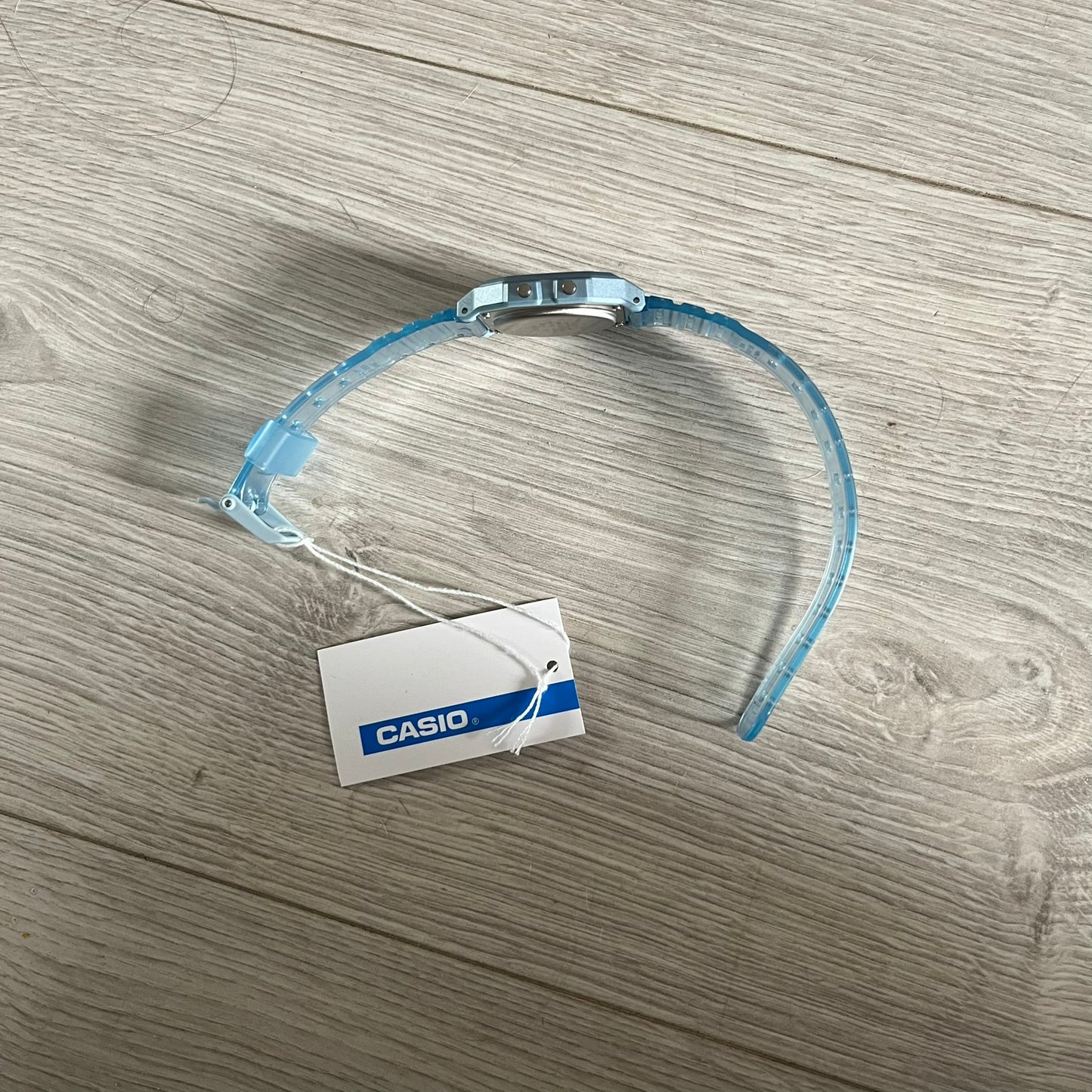 Custom Casio F-91W Blue digital watch featuring a Gradient Blue and green filter screen. Slim 8.5 mm profile, lightweight 21 g build and flexible bio-based resin band ensure lasting comfort. Includes alarm, stopwatch, and microlight function for everyday functionality.