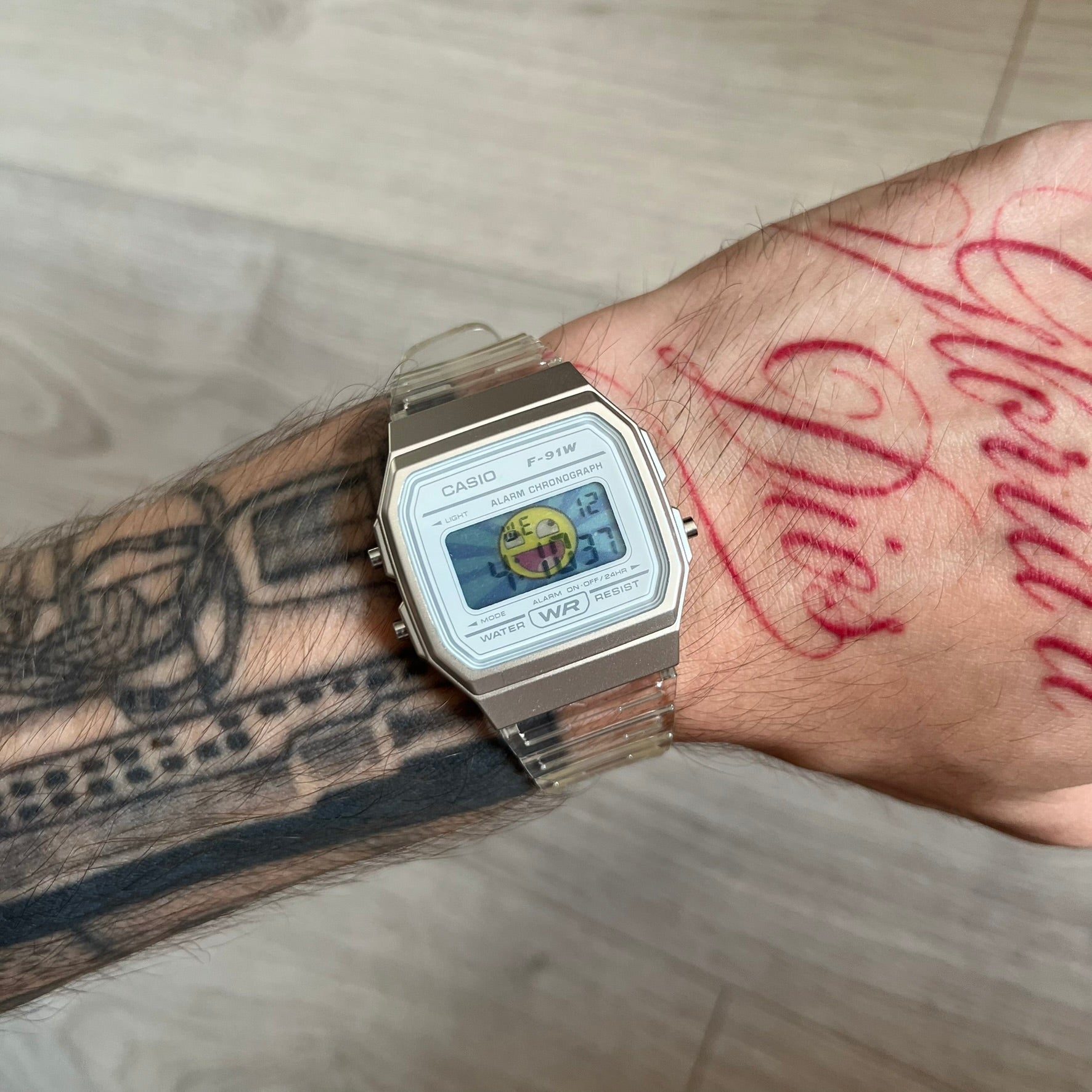 Custom Casio F-91W Clear/Transparent digital watch featuring a Awesome Face filter screen. Slim 8.5 mm profile, lightweight 21 g build and flexible bio-based resin band ensure lasting comfort. Includes alarm, stopwatch, and microlight function for everyday functionality.