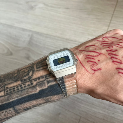 Custom Casio F-91W Clear/Transparent digital watch featuring a Awesome Face filter screen. Slim 8.5 mm profile, lightweight 21 g build and flexible bio-based resin band ensure lasting comfort. Includes alarm, stopwatch, and microlight function for everyday functionality.