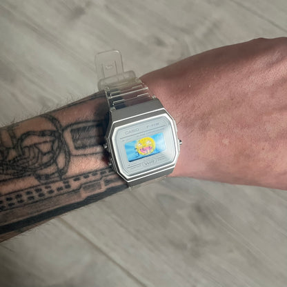 Custom Casio F-91W Clear/Transparent digital watch featuring a Awesome Face filter screen. Slim 8.5 mm profile, lightweight 21 g build and flexible bio-based resin band ensure lasting comfort. Includes alarm, stopwatch, and microlight function for everyday functionality.