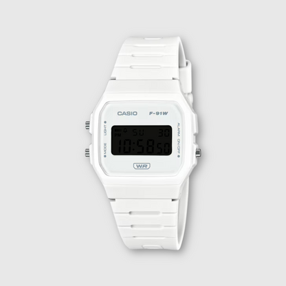 White Casio digital watch on a light gray background