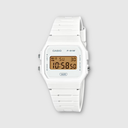 White Casio digital watch on a light gray background