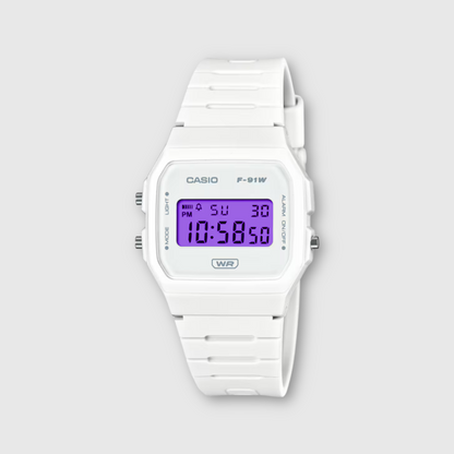 White Casio digital watch on a light gray background