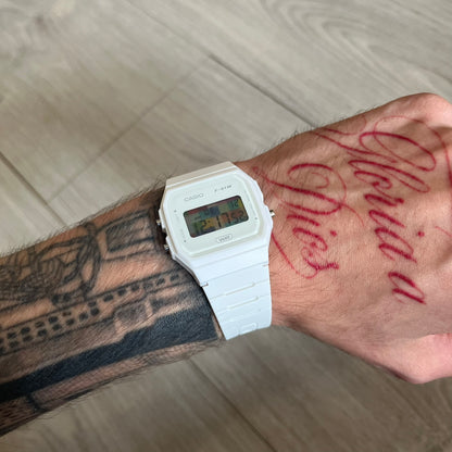 Custom Casio F-91W White digital watch featuring a Multicolor interlocking bricks filter screen. Slim 8.5 mm profile, lightweight 21 g build and flexible bio-based resin band ensure lasting comfort. Includes alarm, stopwatch, and microlight function for everyday functionality.