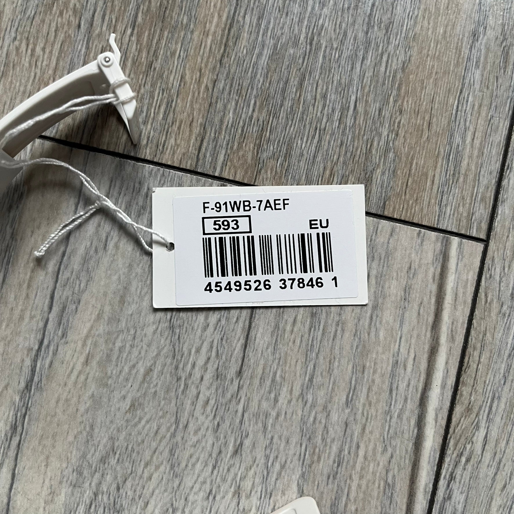 Custom Casio F-91W White digital watch featuring a Bloody filter screen and custom painted straps. Slim 8.5 mm profile, lightweight 21 g build and flexible bio-based resin band ensure lasting comfort. Includes alarm, stopwatch, and microlight function for everyday functionality.

This watch is a 1/1 sample. The paint on the straps is not holding perfectly as with more force it can be smudged. For the best effect we reccomend covering it with a special paint or spray to make it 100% last.&nbsp;