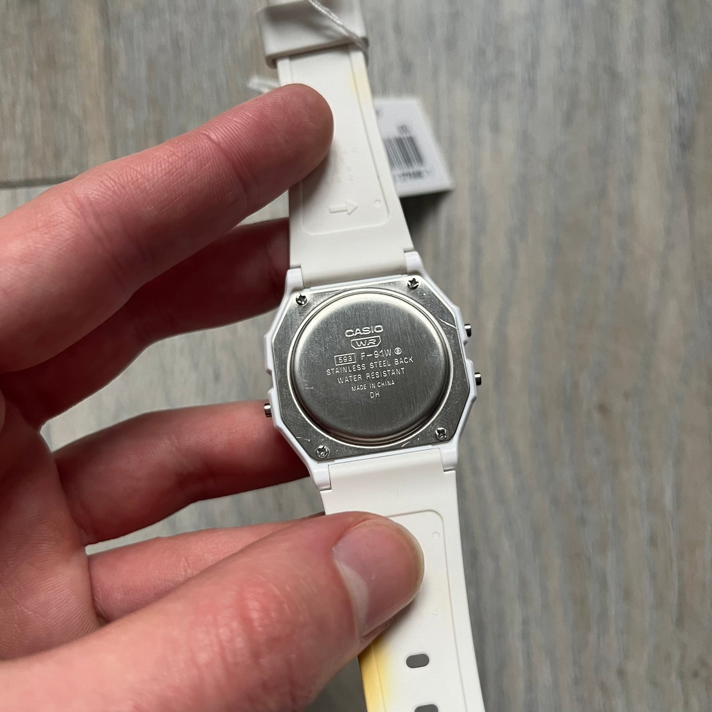 Custom Casio F-91W White digital watch featuring a Bloody filter screen and custom painted straps. Slim 8.5 mm profile, lightweight 21 g build and flexible bio-based resin band ensure lasting comfort. Includes alarm, stopwatch, and microlight function for everyday functionality.

This watch is a 1/1 sample. The paint on the straps is not holding perfectly as with more force it can be smudged. For the best effect we reccomend covering it with a special paint or spray to make it 100% last.&nbsp;