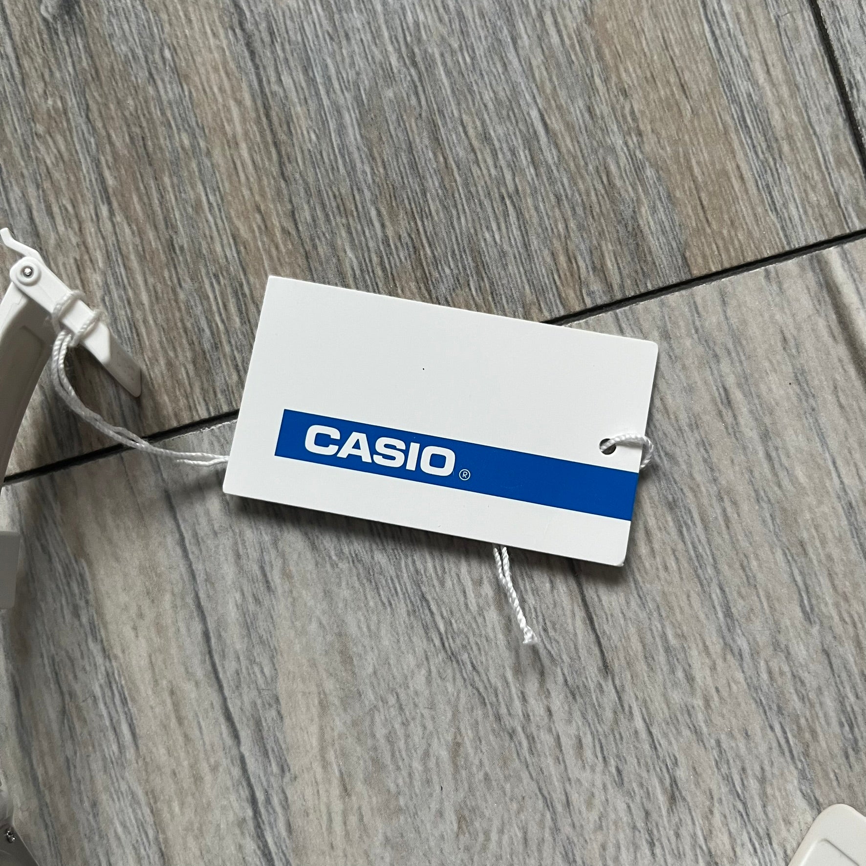 Custom Casio F-91W White digital watch featuring a Bloody filter screen and custom painted straps. Slim 8.5 mm profile, lightweight 21 g build and flexible bio-based resin band ensure lasting comfort. Includes alarm, stopwatch, and microlight function for everyday functionality.

This watch is a 1/1 sample. The paint on the straps is not holding perfectly as with more force it can be smudged. For the best effect we reccomend covering it with a special paint or spray to make it 100% last.&nbsp;