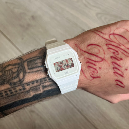 Custom Casio F-91W White digital watch featuring a Bloody filter screen. Slim 8.5 mm profile, lightweight 21 g build and flexible bio-based resin band ensure lasting comfort. Includes alarm, stopwatch, and microlight function for everyday functionality.