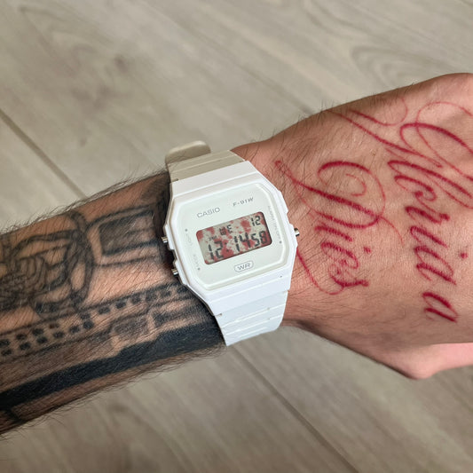 Custom Casio F-91W White digital watch featuring a Bloody filter screen. Slim 8.5 mm profile, lightweight 21 g build and flexible bio-based resin band ensure lasting comfort. Includes alarm, stopwatch, and microlight function for everyday functionality.