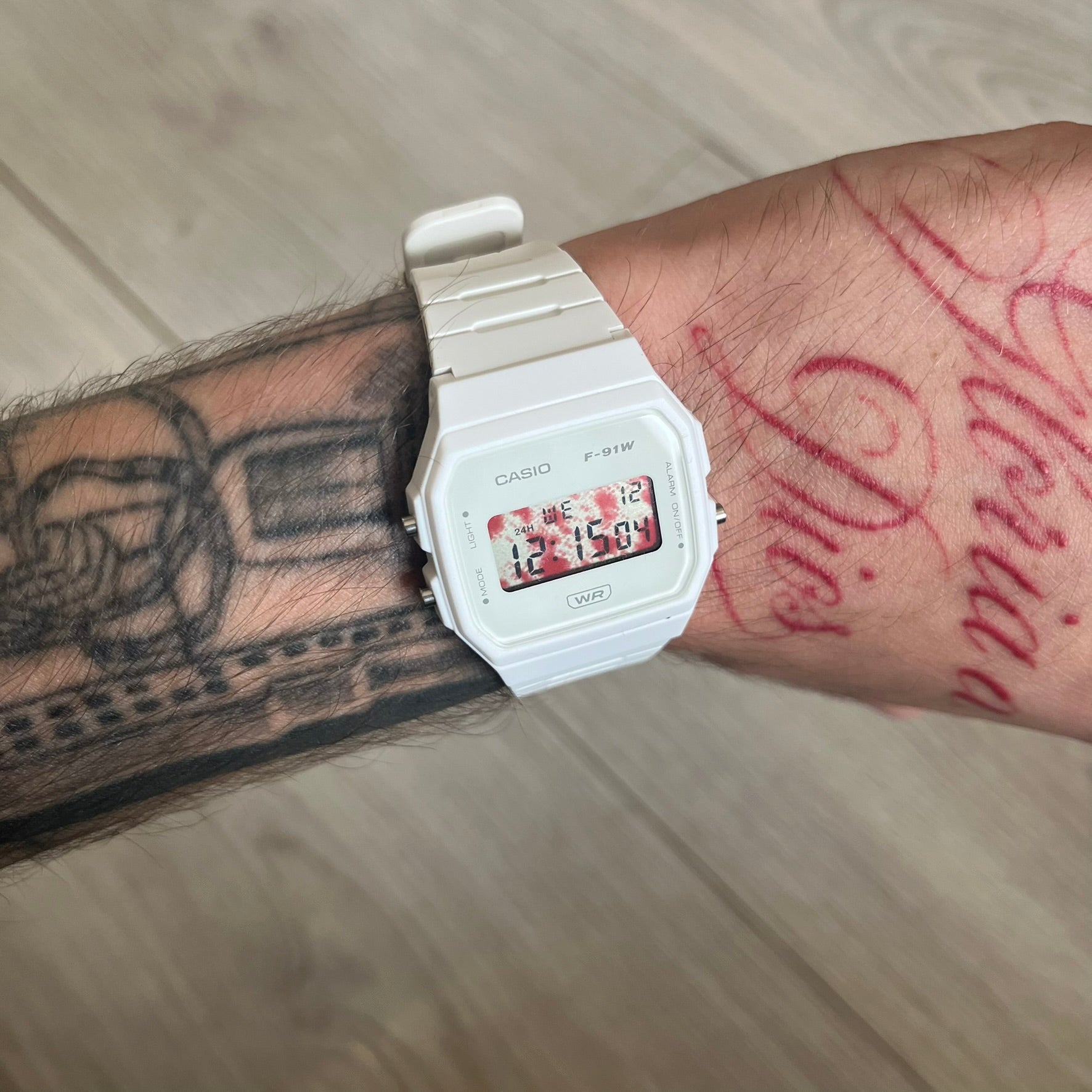 Custom Casio F-91W White digital watch featuring a Bloody filter screen. Slim 8.5 mm profile, lightweight 21 g build and flexible bio-based resin band ensure lasting comfort. Includes alarm, stopwatch, and microlight function for everyday functionality.