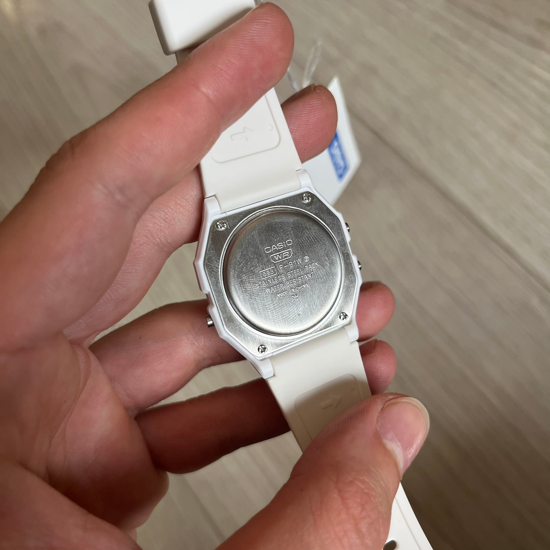 Custom Casio F-91W White digital watch featuring a Bloody filter screen. Slim 8.5 mm profile, lightweight 21 g build and flexible bio-based resin band ensure lasting comfort. Includes alarm, stopwatch, and microlight function for everyday functionality.