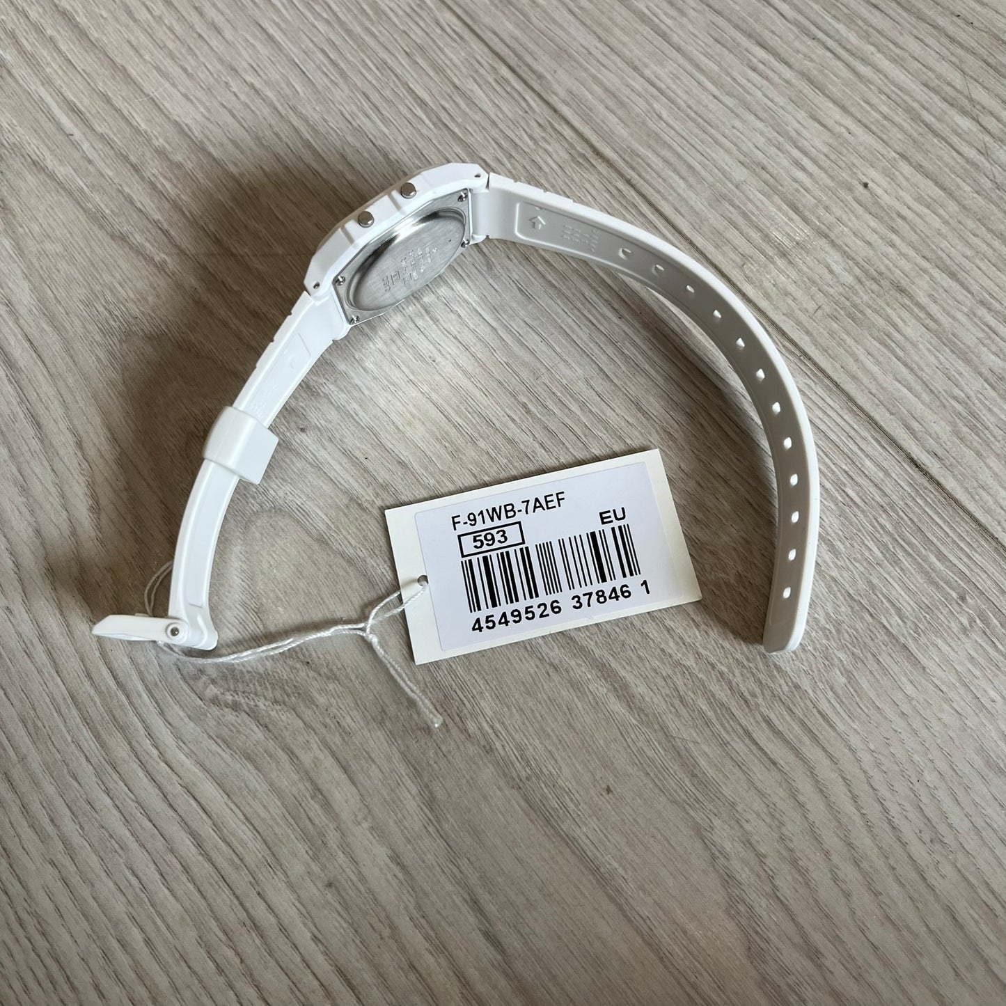 Custom Casio F-91W White digital watch featuring a Bloody filter screen. Slim 8.5 mm profile, lightweight 21 g build and flexible bio-based resin band ensure lasting comfort. Includes alarm, stopwatch, and microlight function for everyday functionality.