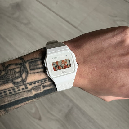 Custom Casio F-91W White digital watch featuring a Bloody filter screen. Slim 8.5 mm profile, lightweight 21 g build and flexible bio-based resin band ensure lasting comfort. Includes alarm, stopwatch, and microlight function for everyday functionality.