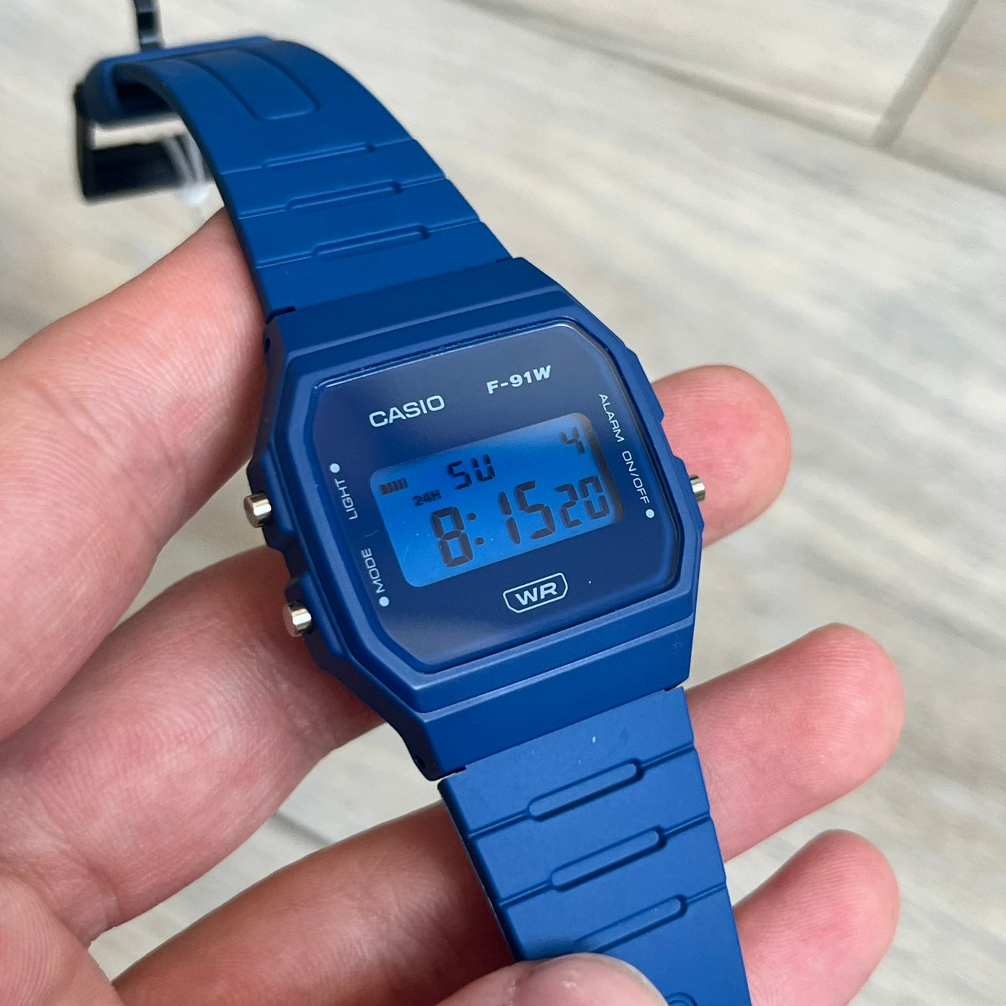 Custom Casio F-91W Dark blue digital watch featuring a matching Blue filter screen. Slim 8.5 mm profile, lightweight 21 g build and flexible resin band ensure lasting comfort. Includes alarm, stopwatch, and microlight function for everyday functionality.