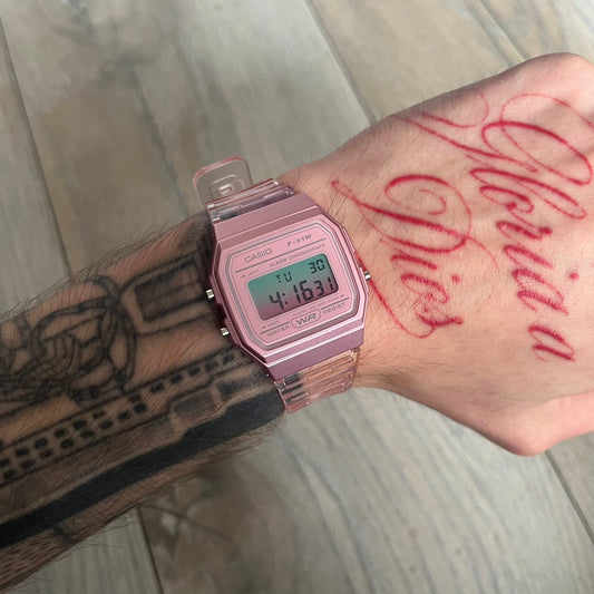 Custom Casio F-91W Pink digital watch featuring a gradient mint and pink filter screen. Slim 8.5 mm profile, lightweight 21 g build and flexible bio-based resin band ensure lasting comfort. Includes alarm, stopwatch, and microlight function for everyday functionality.