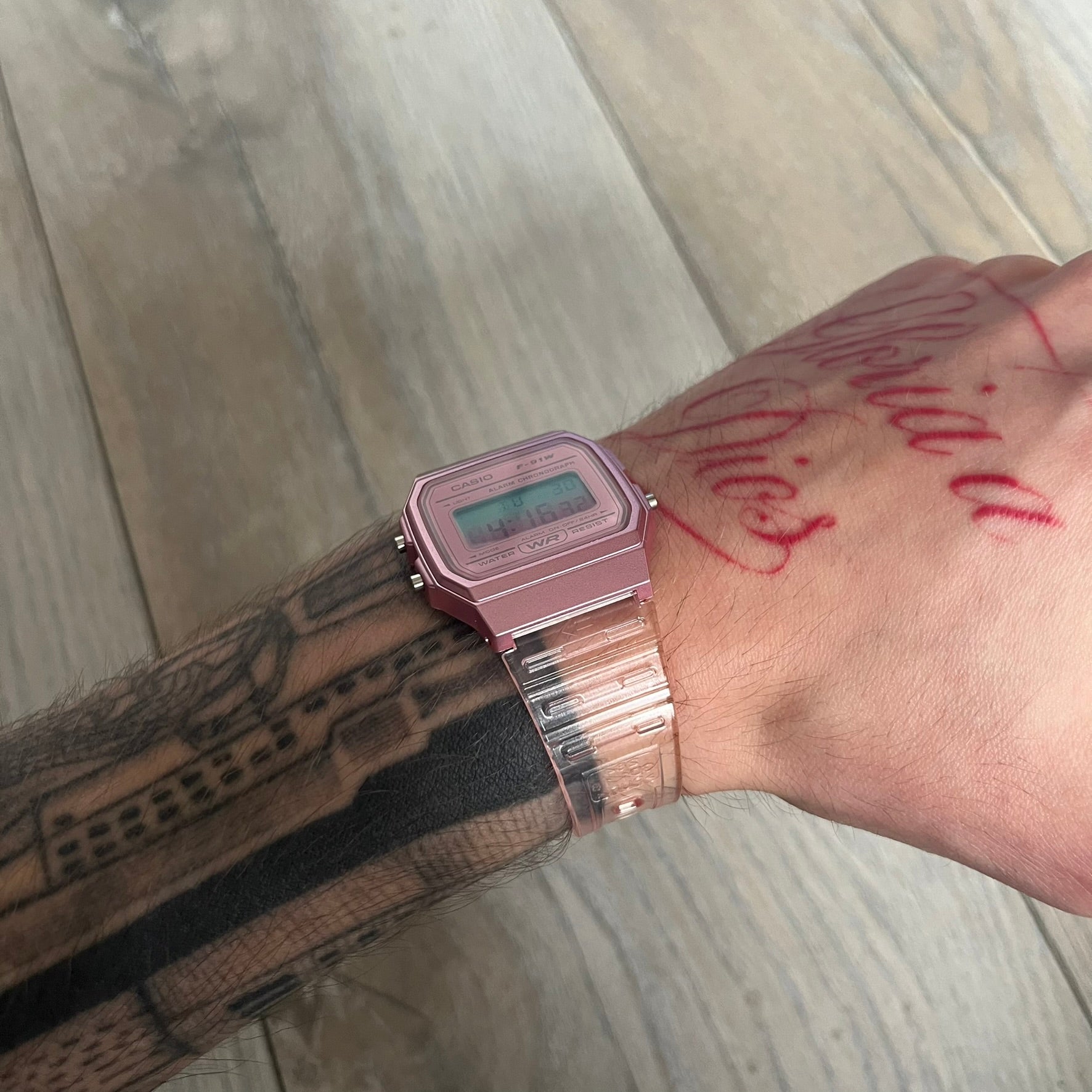 Custom Casio F-91W Pink digital watch featuring a gradient mint and pink filter screen. Slim 8.5 mm profile, lightweight 21 g build and flexible bio-based resin band ensure lasting comfort. Includes alarm, stopwatch, and microlight function for everyday functionality.