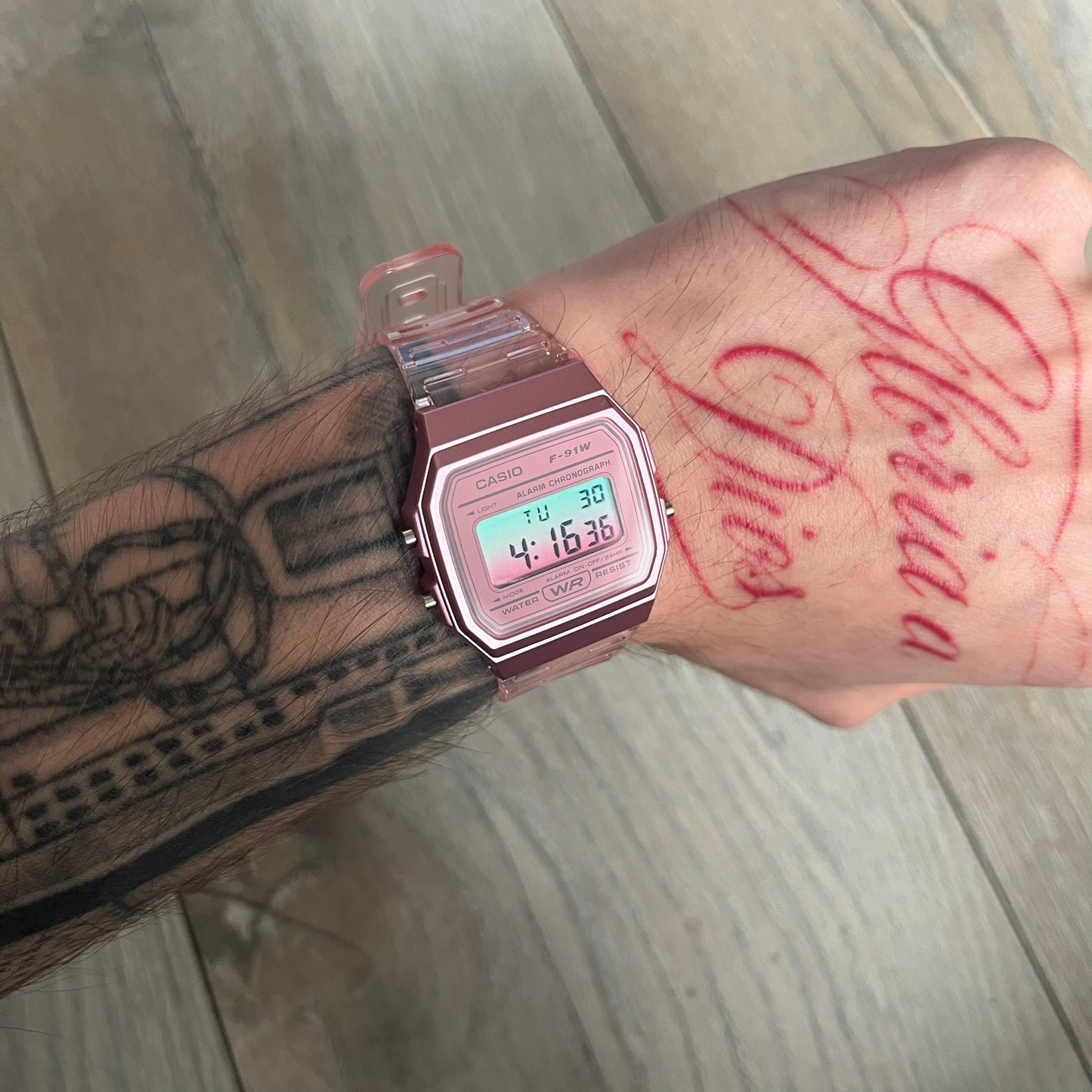 Custom Casio F-91W Pink digital watch featuring a gradient mint and pink filter screen. Slim 8.5 mm profile, lightweight 21 g build and flexible bio-based resin band ensure lasting comfort. Includes alarm, stopwatch, and microlight function for everyday functionality.