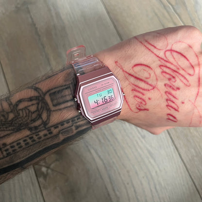 Custom Casio F-91W Pink digital watch featuring a gradient mint and pink filter screen. Slim 8.5 mm profile, lightweight 21 g build and flexible bio-based resin band ensure lasting comfort. Includes alarm, stopwatch, and microlight function for everyday functionality.