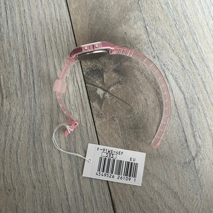 Custom Casio F-91W Pink digital watch featuring a gradient mint and pink filter screen. Slim 8.5 mm profile, lightweight 21 g build and flexible bio-based resin band ensure lasting comfort. Includes alarm, stopwatch, and microlight function for everyday functionality.