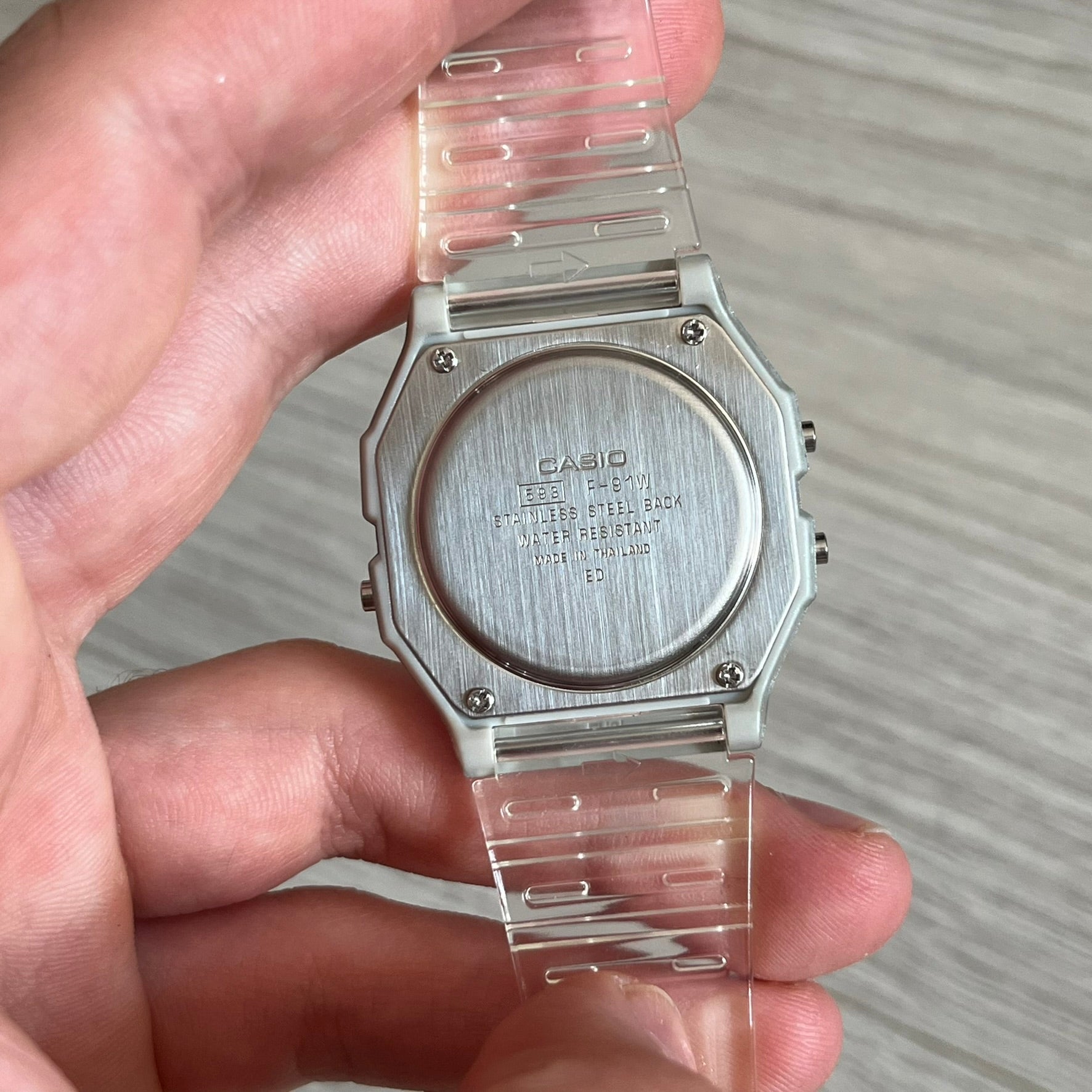 Custom Casio F-91W Clear/Transparent digital watch featuring a China Flag filter screen. Slim 8.5 mm profile, lightweight 21 g build and flexible bio-based resin band ensure lasting comfort. Includes alarm, stopwatch, and microlight function for everyday functionality.
