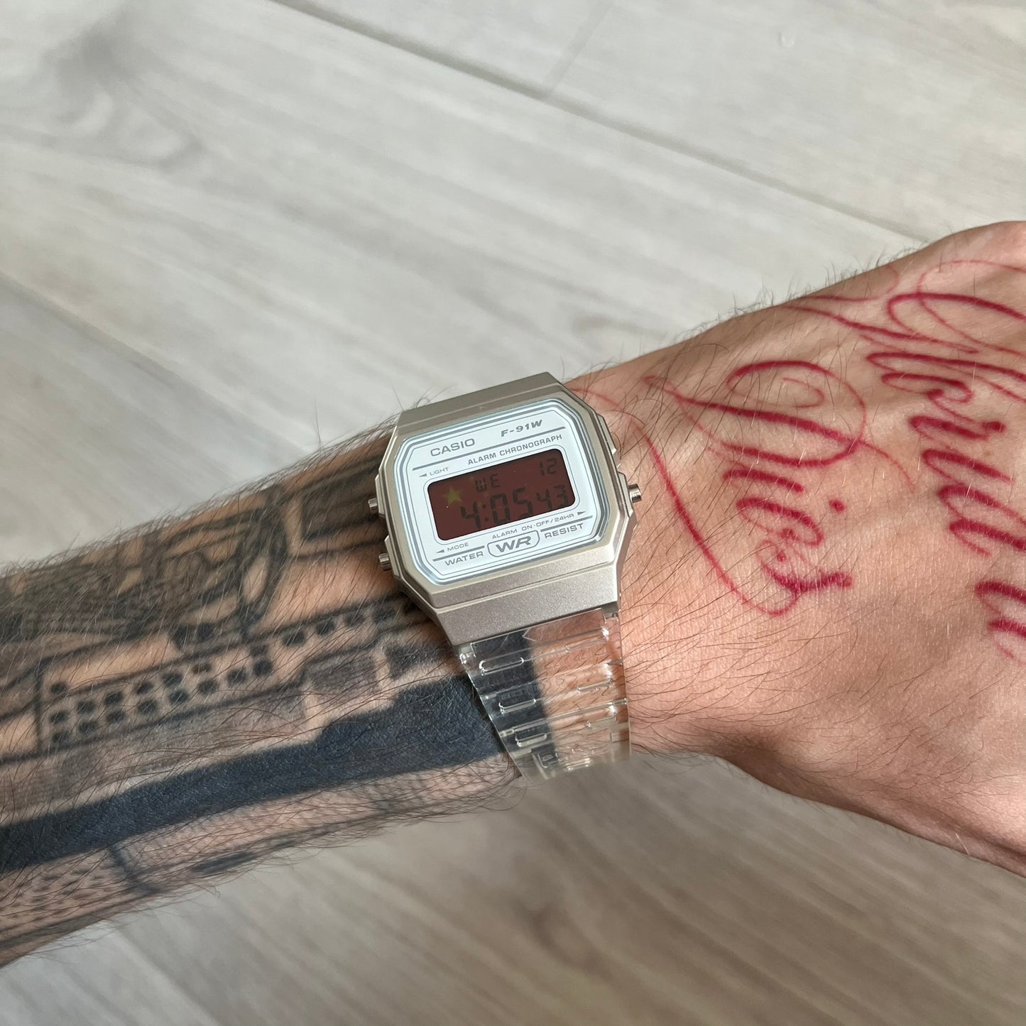 Custom Casio F-91W Clear/Transparent digital watch featuring a China Flag filter screen. Slim 8.5 mm profile, lightweight 21 g build and flexible bio-based resin band ensure lasting comfort. Includes alarm, stopwatch, and microlight function for everyday functionality.