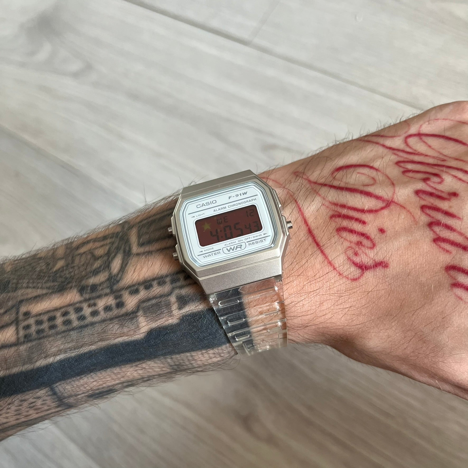 Custom Casio F-91W Clear/Transparent digital watch featuring a China Flag filter screen. Slim 8.5 mm profile, lightweight 21 g build and flexible bio-based resin band ensure lasting comfort. Includes alarm, stopwatch, and microlight function for everyday functionality.