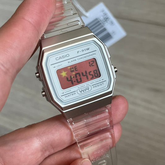 Custom Casio F-91W Clear/Transparent digital watch featuring a China Flag filter screen. Slim 8.5 mm profile, lightweight 21 g build and flexible bio-based resin band ensure lasting comfort. Includes alarm, stopwatch, and microlight function for everyday functionality.