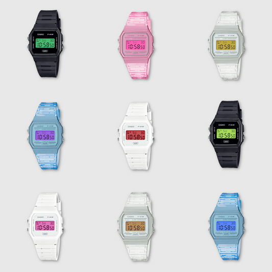 Collection of digital watches in various colors on a light gray background
