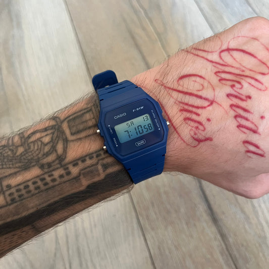 Custom Casio F-91W Dark blue digital watch featuring a Gradient blue filter screen. Slim 8.5 mm profile, lightweight 21 g build and flexible resin band ensure lasting comfort. Includes alarm, stopwatch, and microlight function for everyday functionality.