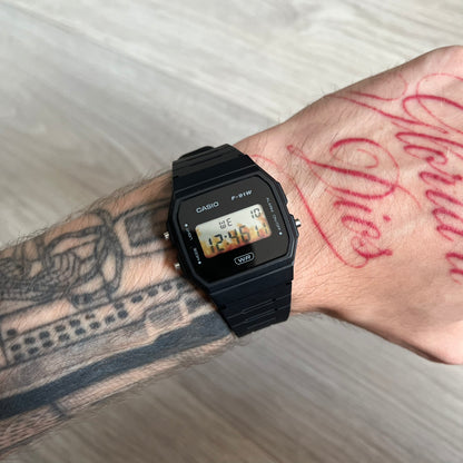 Custom Casio F-91W Black digital watch featuring a Flame filter screen. Slim 8.5 mm profile, lightweight 21 g build and flexible bio-based resin band ensure lasting comfort. Includes alarm, stopwatch, and microlight function for everyday functionality.
