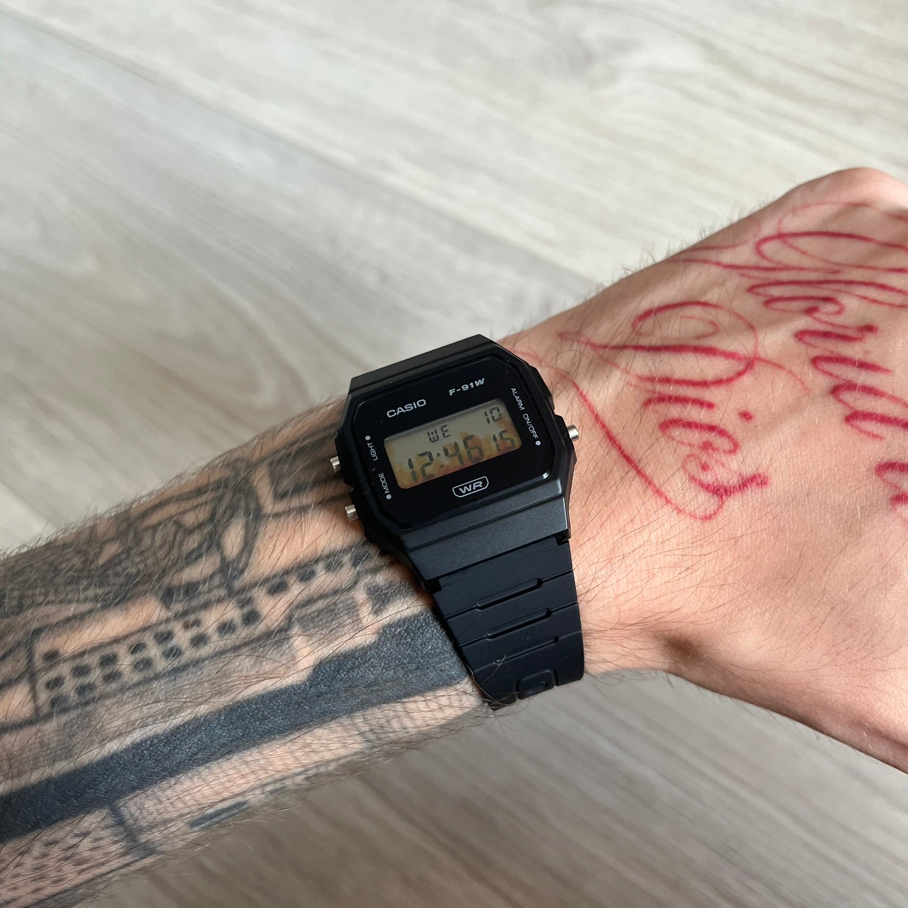 Custom Casio F-91W Black digital watch featuring a Flame filter screen. Slim 8.5 mm profile, lightweight 21 g build and flexible bio-based resin band ensure lasting comfort. Includes alarm, stopwatch, and microlight function for everyday functionality.