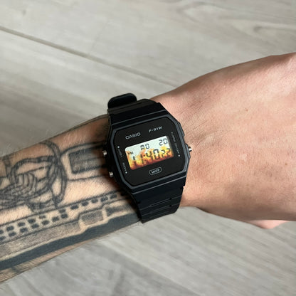 Custom Casio F-91W Black digital watch featuring a Flame filter screen. Slim 8.5 mm profile, lightweight 21 g build and flexible bio-based resin band ensure lasting comfort. Includes alarm, stopwatch, and microlight function for everyday functionality.