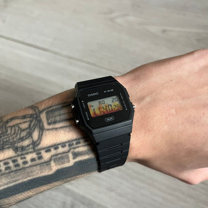 Custom Casio F-91W Black digital watch featuring a Flame filter screen. Slim 8.5 mm profile, lightweight 21 g build and flexible bio-based resin band ensure lasting comfort. Includes alarm, stopwatch, and microlight function for everyday functionality.
