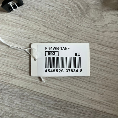 Custom Casio F-91W Black digital watch featuring a Flame filter screen. Slim 8.5 mm profile, lightweight 21 g build and flexible bio-based resin band ensure lasting comfort. Includes alarm, stopwatch, and microlight function for everyday functionality.