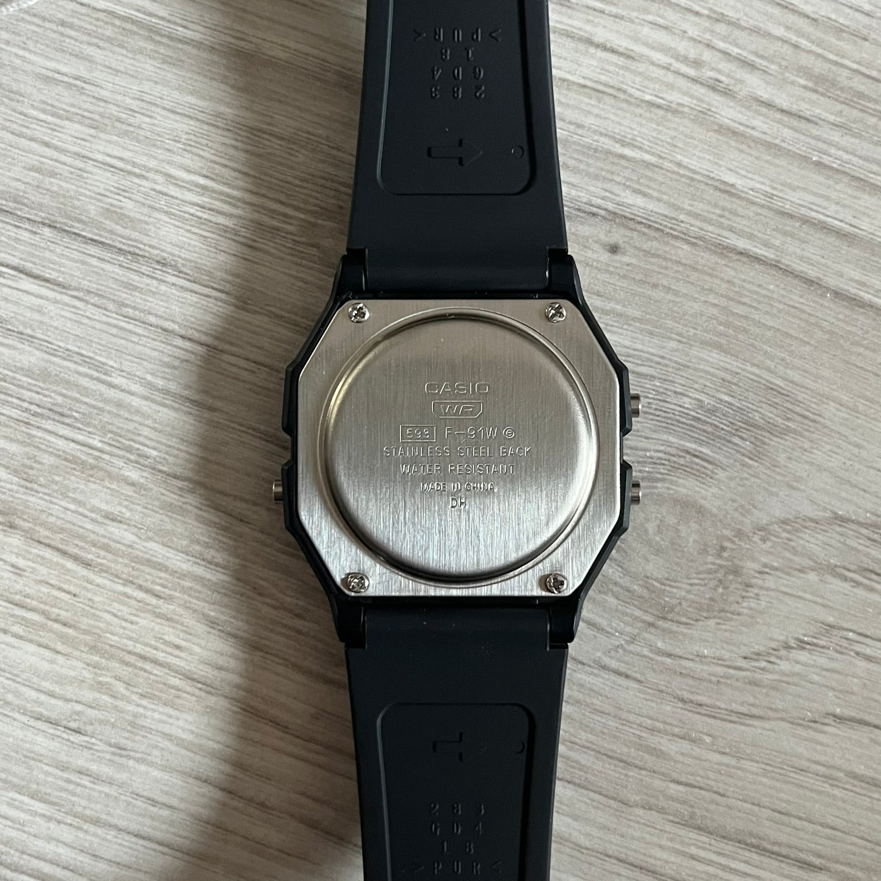 Custom Casio F-91W Black digital watch featuring a Flame filter screen. Slim 8.5 mm profile, lightweight 21 g build and flexible bio-based resin band ensure lasting comfort. Includes alarm, stopwatch, and microlight function for everyday functionality.