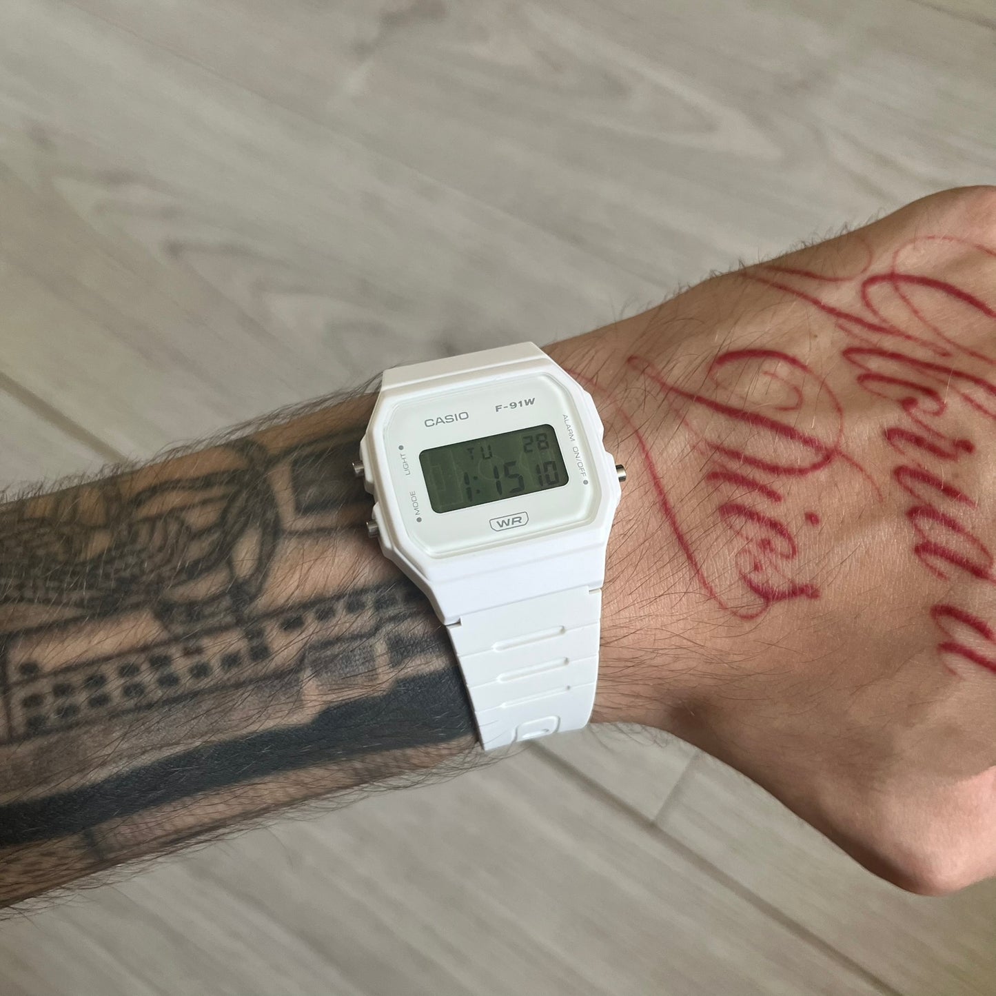 Custom Casio F-91W White digital watch featuring a Green Football Pitch filter screen. Slim 8.5 mm profile, lightweight 21 g build and flexible bio-based resin band ensure lasting comfort. Includes alarm, stopwatch, and microlight function for everyday functionality.