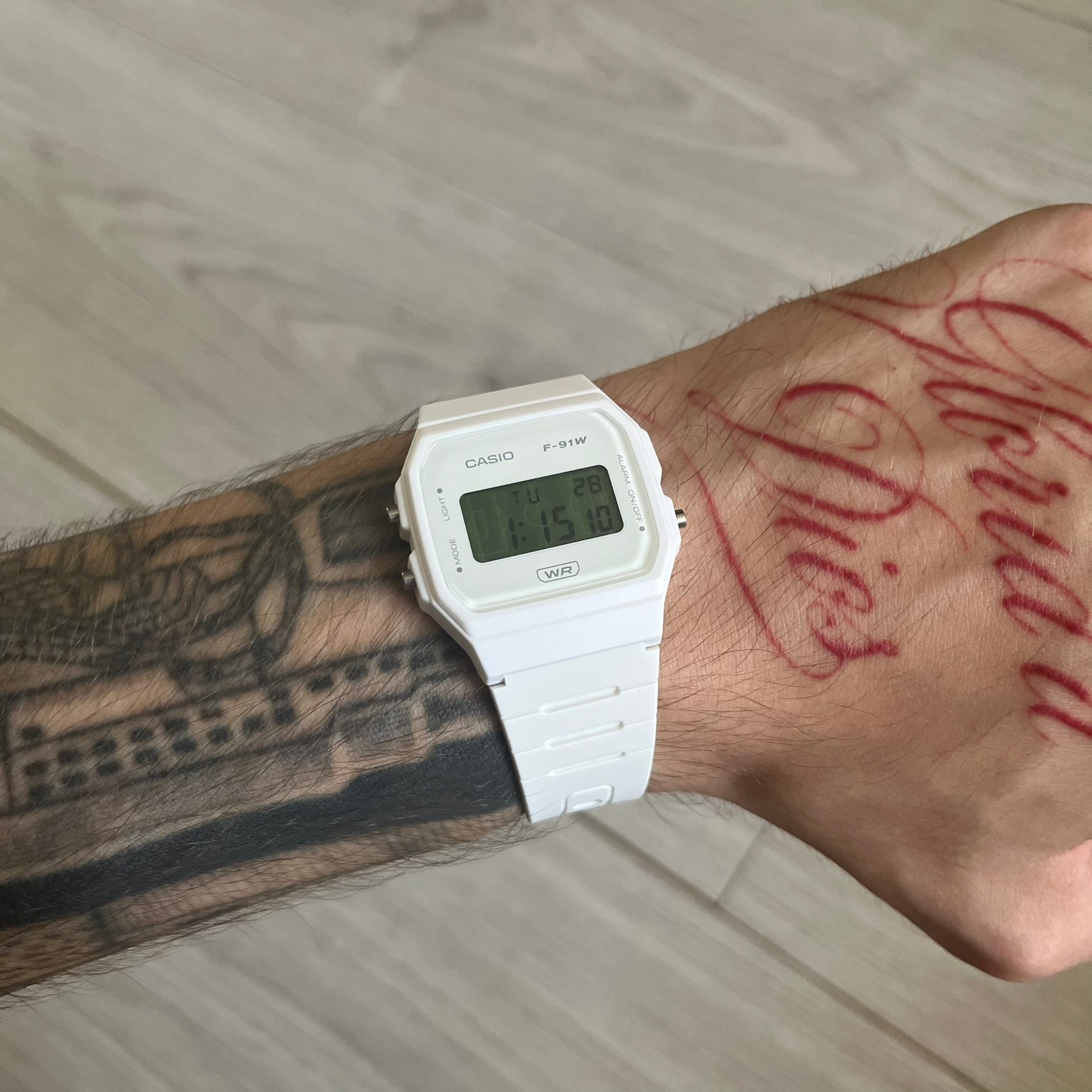 Custom Casio F-91W White digital watch featuring a Green Football Pitch filter screen. Slim 8.5 mm profile, lightweight 21 g build and flexible bio-based resin band ensure lasting comfort. Includes alarm, stopwatch, and microlight function for everyday functionality.