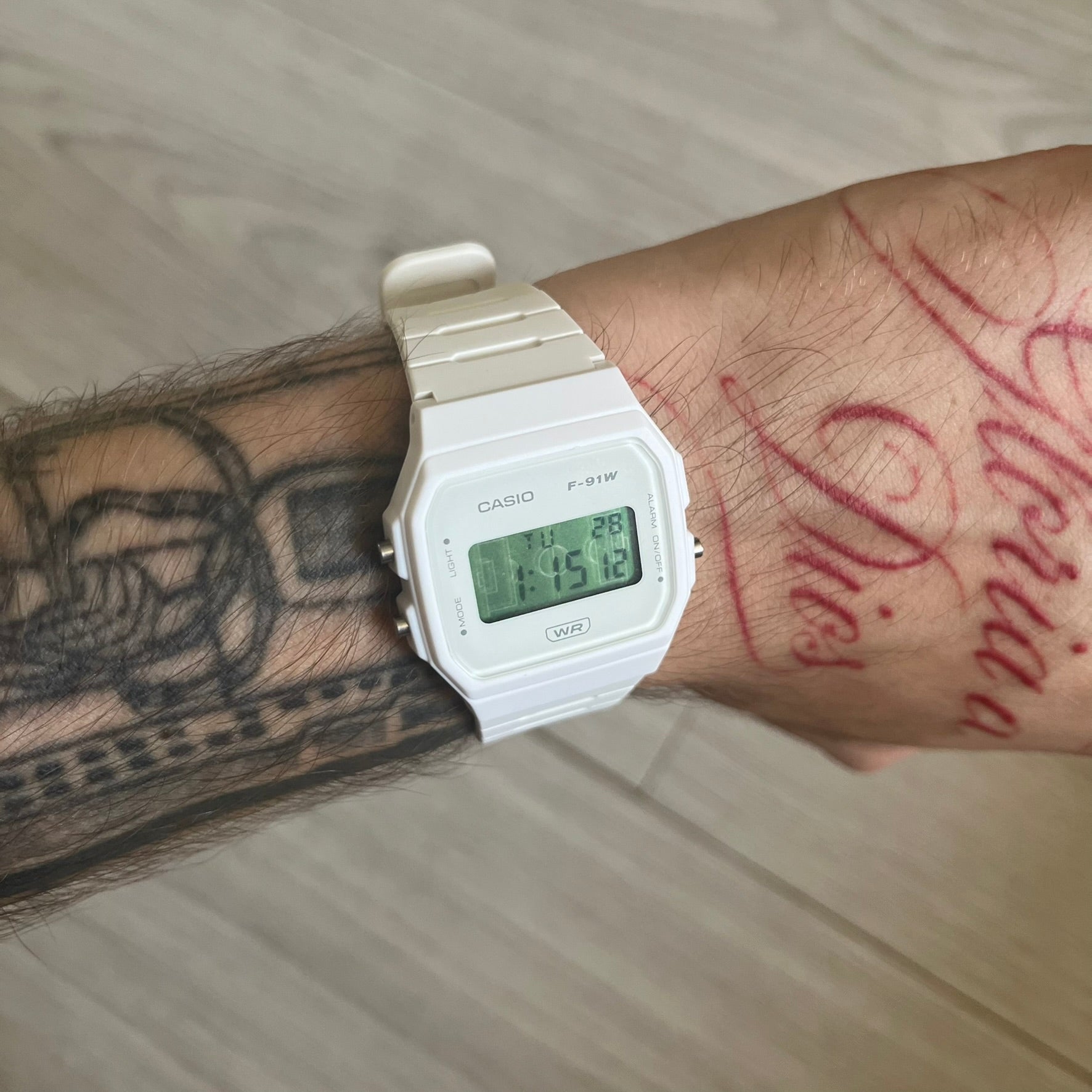 Custom Casio F-91W White digital watch featuring a Green Football Pitch filter screen. Slim 8.5 mm profile, lightweight 21 g build and flexible bio-based resin band ensure lasting comfort. Includes alarm, stopwatch, and microlight function for everyday functionality.