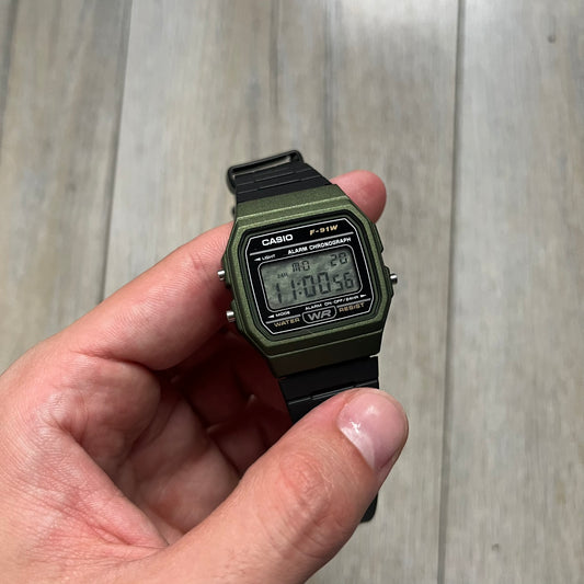 Custom Casio F-91W Military Green digital watch featuring a Camo filter screen. Slim 8.5 mm profile, lightweight 21 g build and flexible bio-based resin band ensure lasting comfort. Includes alarm, stopwatch, and microlight function for everyday functionality.