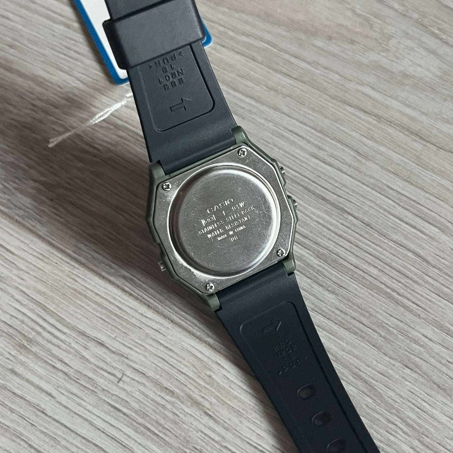 Custom Casio F-91W Military Green digital watch featuring a Camo filter screen. Slim 8.5 mm profile, lightweight 21 g build and flexible bio-based resin band ensure lasting comfort. Includes alarm, stopwatch, and microlight function for everyday functionality.