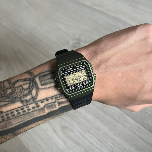Custom Casio F-91W Military Green digital watch featuring a Camo filter screen. Slim 8.5 mm profile, lightweight 21 g build and flexible bio-based resin band ensure lasting comfort. Includes alarm, stopwatch, and microlight function for everyday functionality.