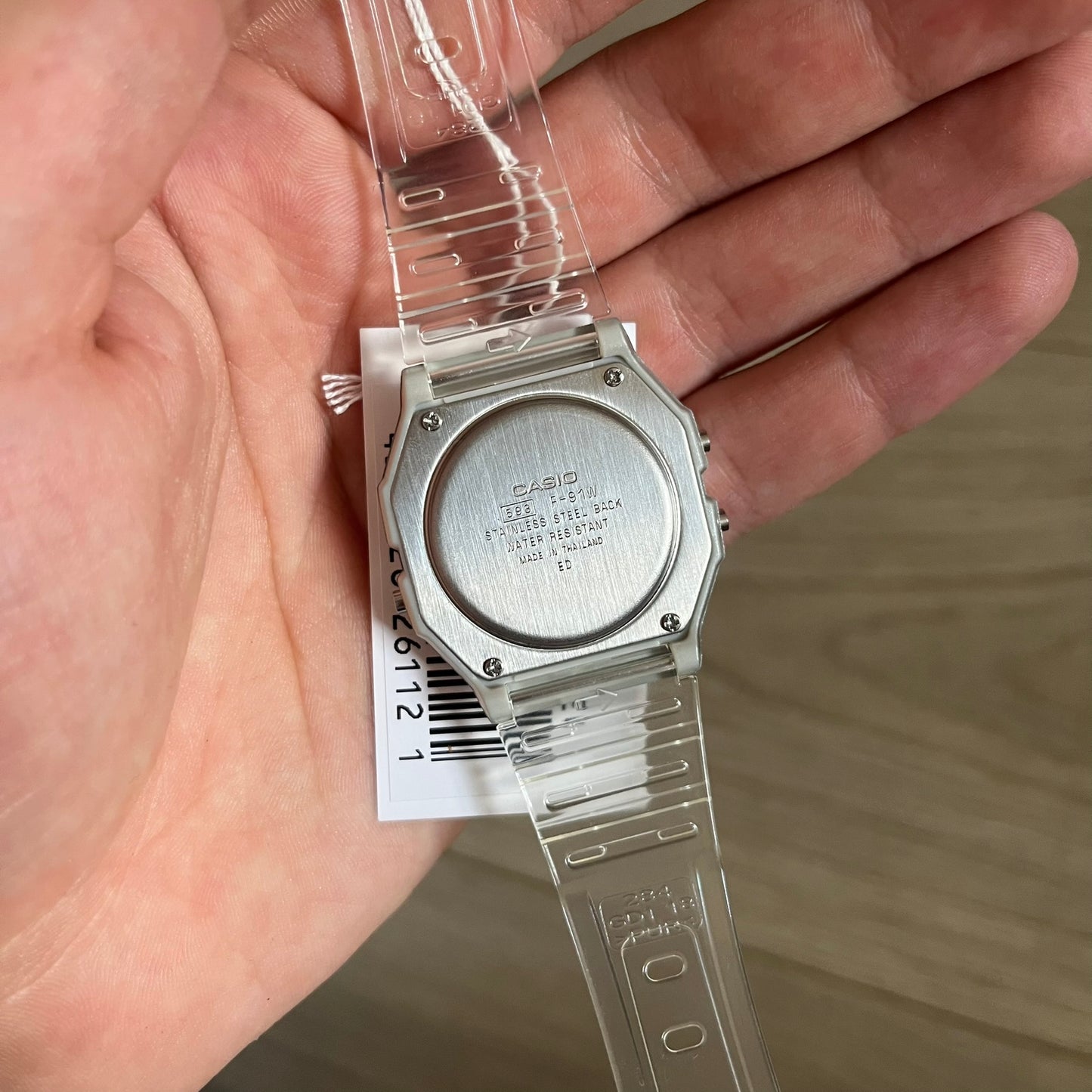 Custom Casio F-91W Clear/Transparent digital watch featuring a Gradient Blue filter screen. Slim 8.5 mm profile, lightweight 21 g build and flexible bio-based resin band ensure lasting comfort. Includes alarm, stopwatch, and microlight function for everyday functionality.