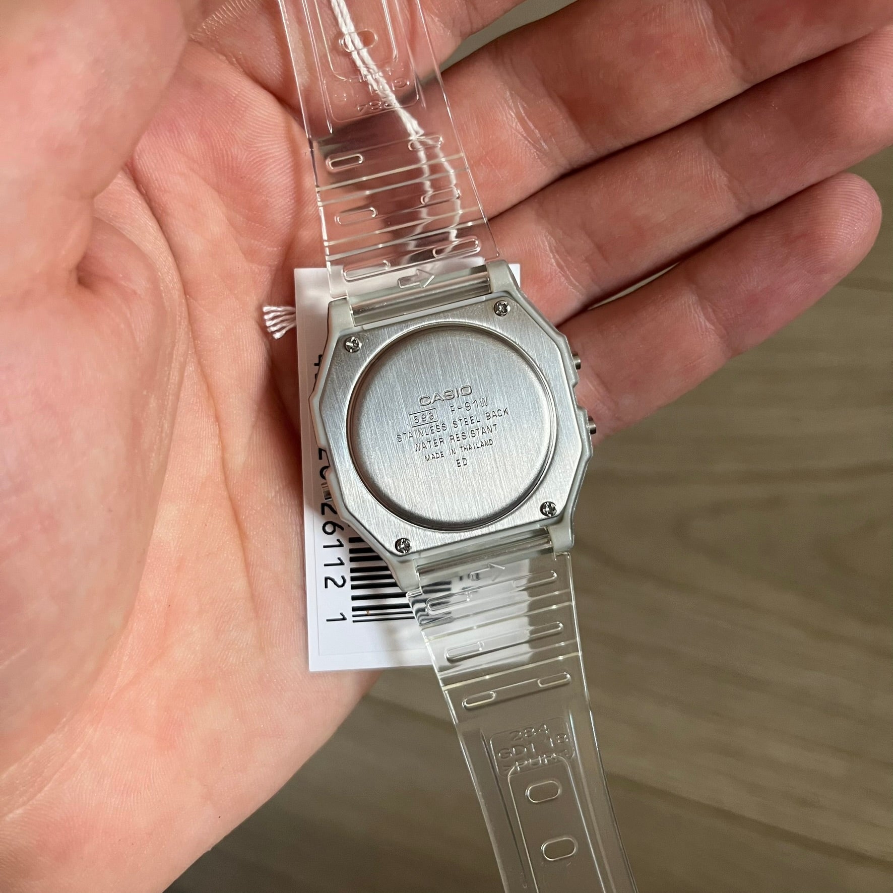 Custom Casio F-91W Clear/Transparent digital watch featuring a Gradient Blue filter screen. Slim 8.5 mm profile, lightweight 21 g build and flexible bio-based resin band ensure lasting comfort. Includes alarm, stopwatch, and microlight function for everyday functionality.